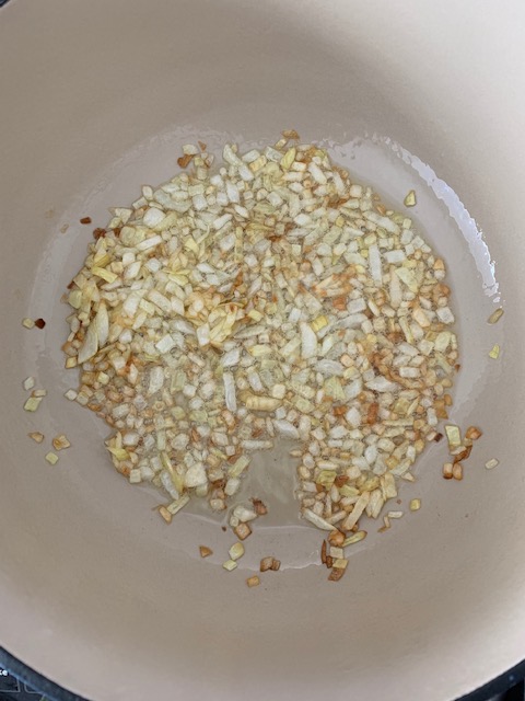 Frying onions is base for most Indian curries. You should fry them until they are golden brown, as shown in this image. 