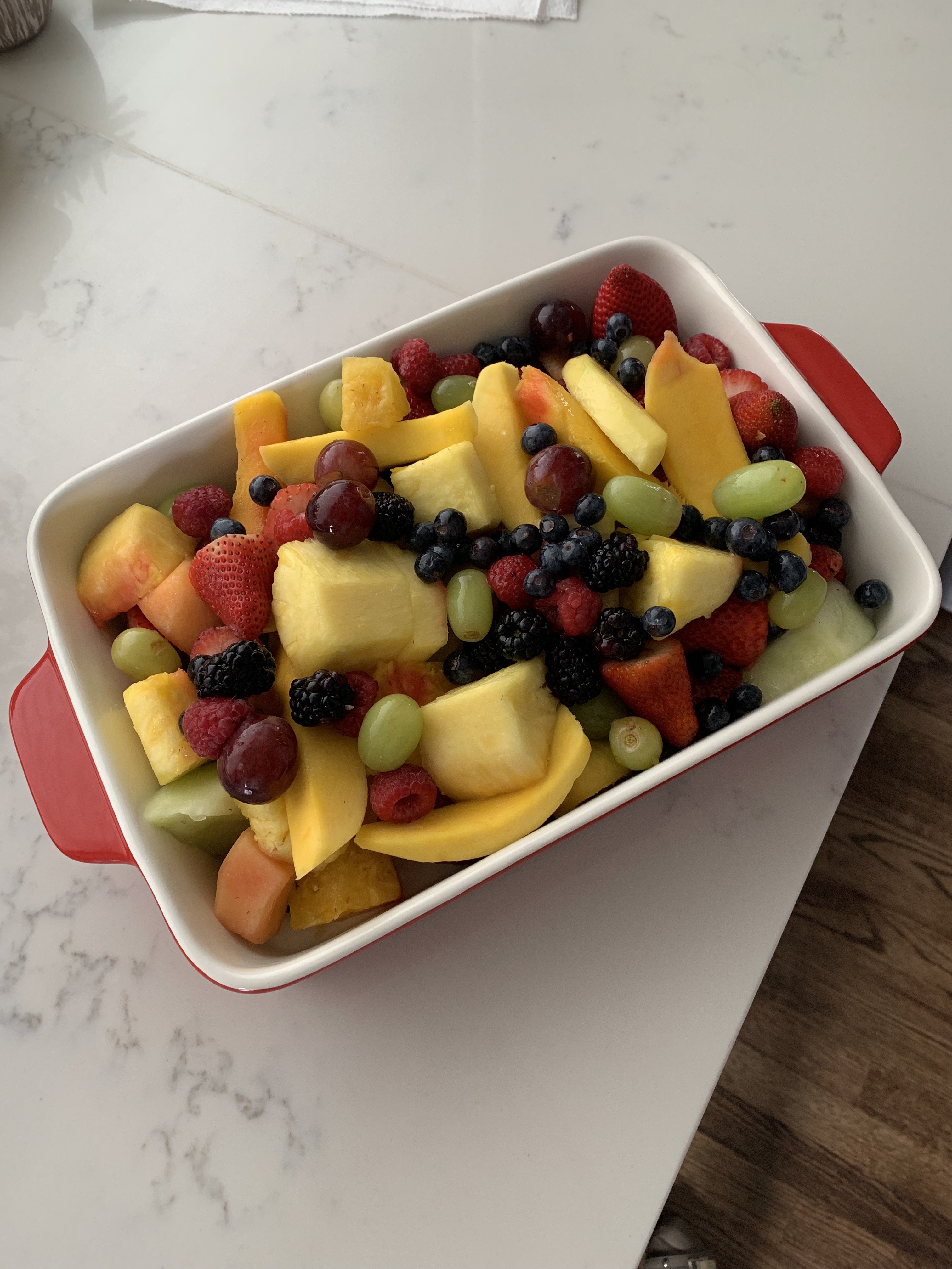Easter Fruit Salad. I bought ready-made fruit salad from the grocery store and dumped it into a casserole dish. Done and Done